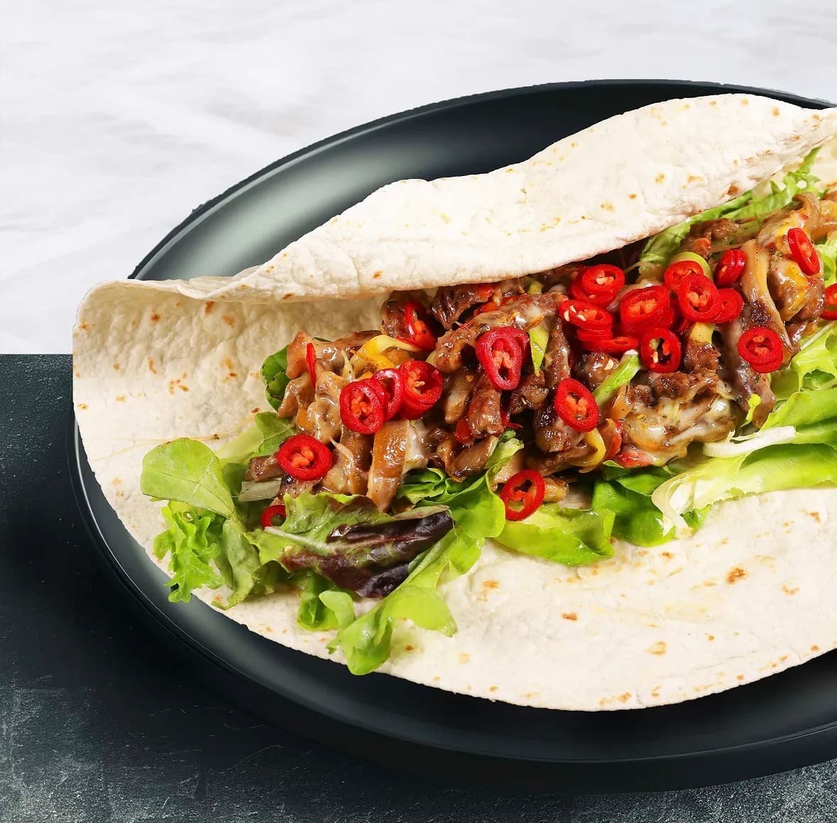 Tortilla wholesale product gallery — flour tortillas on production line — wholesale tortilla manufacturer
